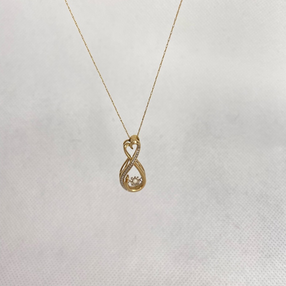10k Gold floating diamond pendant necklace